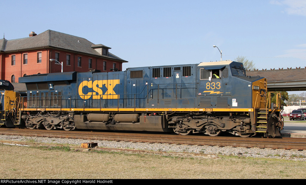 CSX 833 passes the station